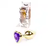 Plug-Jawellery Gold with Purple Diamond. Biżuteria Analna Złoty Plug z Fioletowym Diamentem.