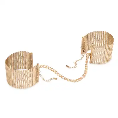 Bijoux Indiscrects - Metallic Mesh Handcuffs Gold. Eleganckie złote kajdanki. Mogą służyć jako biżuteria. 