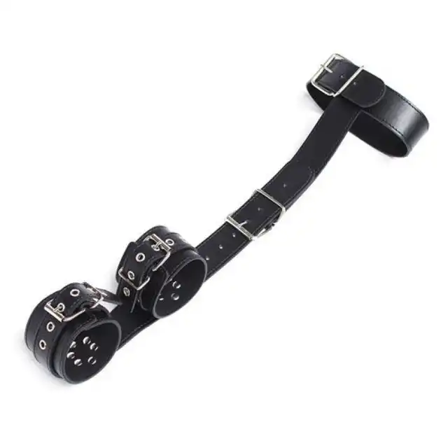 Toyz 4 Lover - Back Cuffs and Collar Restraint. Uprząż do krępowania rąk przy ciele ze sztucznej skóry. Bestseller w świetnej cenie!