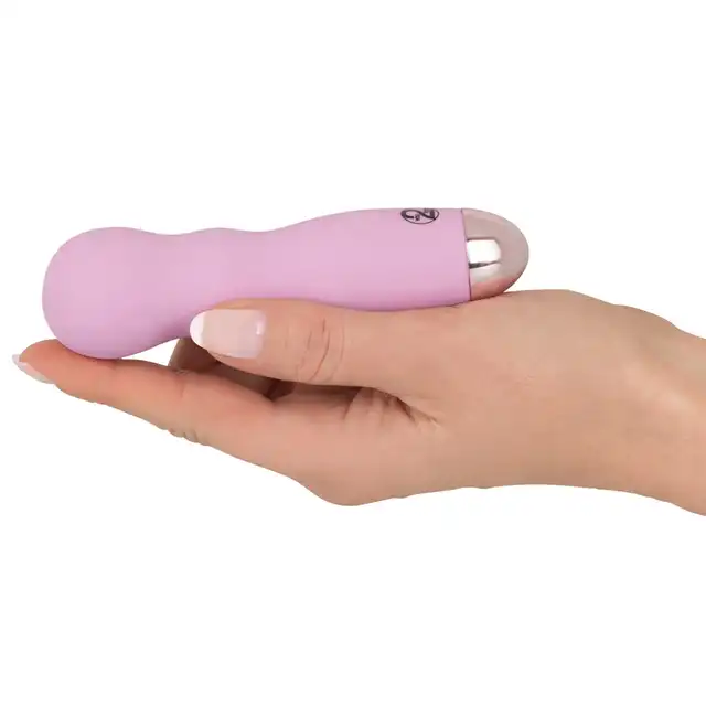 Cuties - Mini Vibrator Pink - kieszonkowy wibrator w jasnoróżowym kolorze, nieregularny kształt, 7 funkcji wibracji