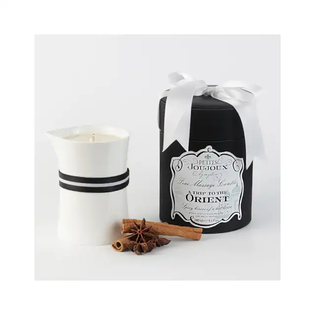 Petits Joujoux - Massage Candle Orient 190g . Świeca do masażu o cudownym zapachu granatu i białego pieprzu. Luksusowa. Mega Sale!