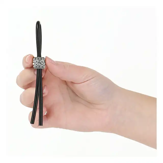 Lux Active - Tether Adjustable Cock Tie. Czarne lasso na penisa z motywem czaszki 
