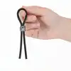 Lux Active - Tether Adjustable Cock Tie. Czarne lasso na penisa z motywem czaszki 