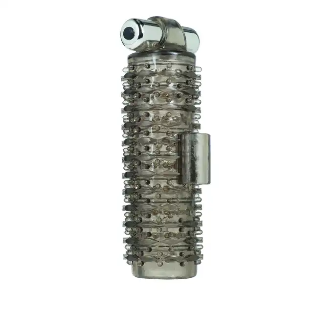 Apollo - Wireless 7-Function Stroker. Teksturowana nakładka na penisa z wibracjami