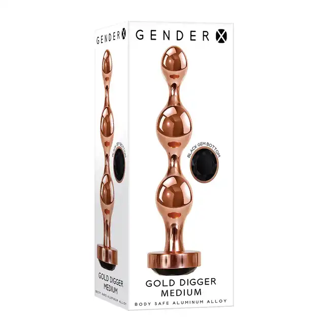Gender X - Gold Digger M. Średni, elegancki i stylowy. Metalowa wtyczka analna w kolorze rose gold z czarnym klejnotem w podstawie. 