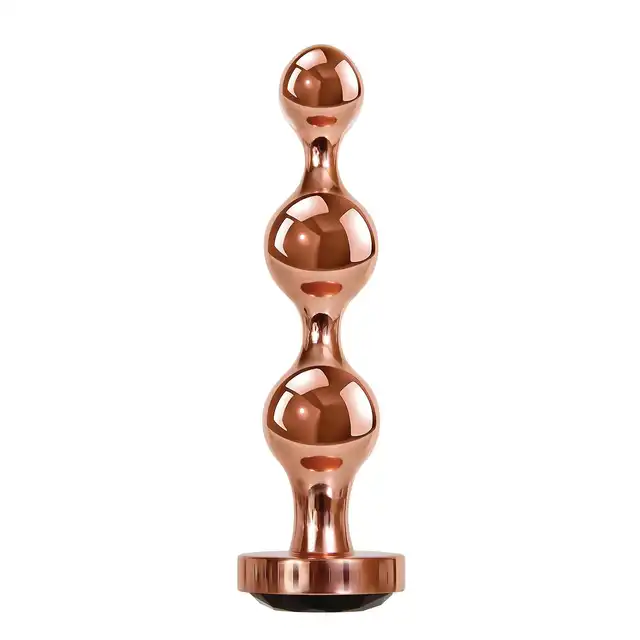 Gender X - Gold Digger L. Duży, elegancki i stylowy. Metalowa wtyczka analna w kolorze rose gold z czarnym klejnotem w podstawie. 