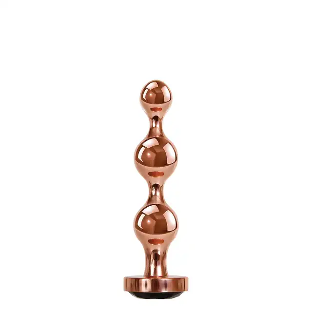 Gender X - Gold Digger S. Mały, elegancki i stylowy. Metalowa wtyczka analna w kolorze rose gold z czarnym klejnotem w podstawie. 