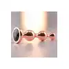 Gender X - Gold Digger M. Średni, elegancki i stylowy. Metalowa wtyczka analna w kolorze rose gold z czarnym klejnotem w podstawie. 