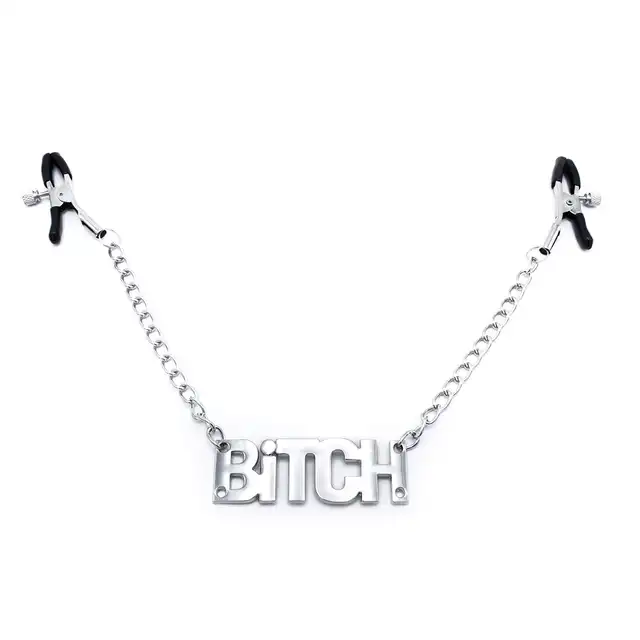 Oproducts - Nipple Clamps Bitch. Stalowe  regulowane klamerki na sutki z masywnym napisem Bitch i łańcuszkiem