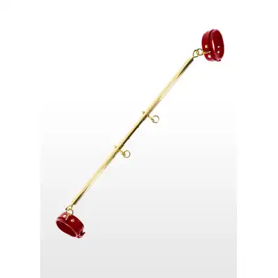 Taboom - Expandable Spread Bar with Ankle Cuffs. Wytrzymały drążek w zestawie z kajdankami na kostki. Regulacja długości drążka pozwala Ci rozchylić nogi partnerki tak jak lubisz
