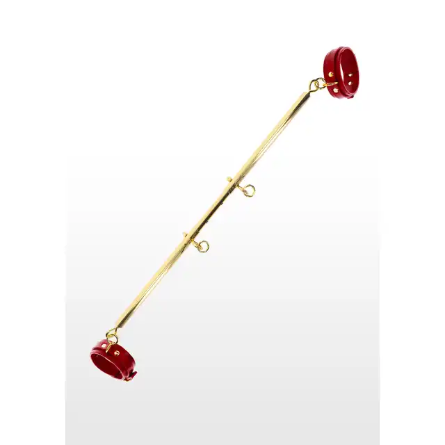 Taboom - Expandable Spread Bar with Ankle Cuffs. Wytrzymały drążek w zestawie z kajdankami na kostki. Regulacja długości drążka pozwala Ci rozchylić nogi partnerki tak jak lubisz