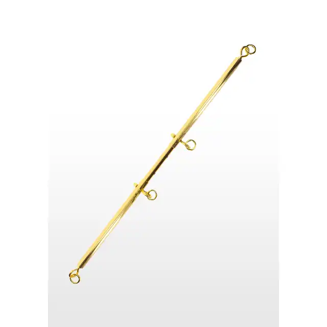 Taboom - Expandable Spread Bar with Ankle Cuffs. Wytrzymały drążek w zestawie z kajdankami na kostki. Regulacja długości drążka pozwala Ci rozchylić nogi partnerki tak jak lubisz