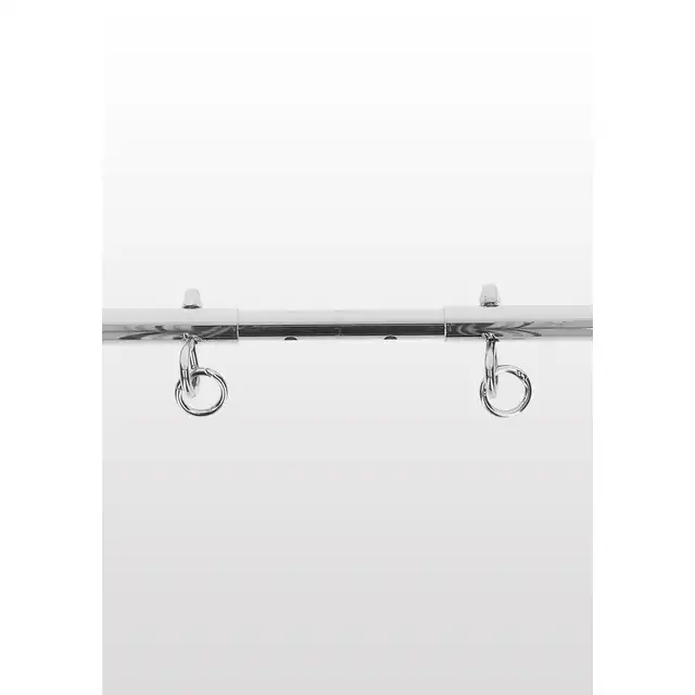 Taboom - Expandable Spread Bar with Ankle Cuffs. Wytrzymały drążek w zestawie z kajdankami na kostki. Regulacja długości drążka pozwala Ci rozchylić nogi partnerki tak jak lubisz