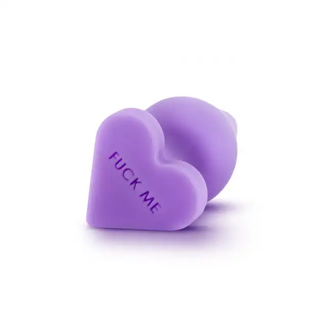 Blush - Candy Heart Fuck Me Purple L - fioletowy korek analny z napisem. Kształt serca na końcówce
