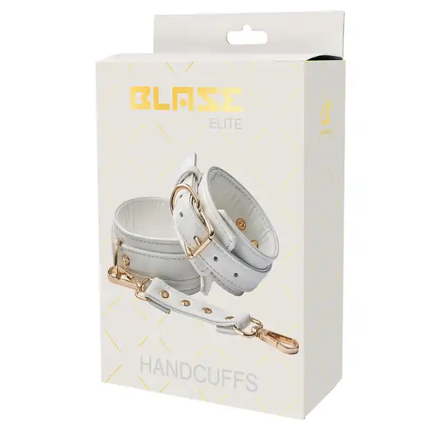 Blaze - Elite Handcuffs White. Stylowe regulowane kajdanki wykonane z białej sztucznej skóry wzbogacone o złote detale. 