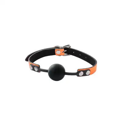 Radiant - Ball Gag Glow In The Dark Orange. Świecący w ciemności knebel z silikonową kulką o średnicy 4 cm. Fluorescencyjnie futurystycznie pomarańczowy. 