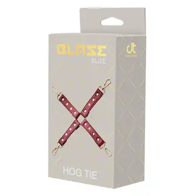 Blaze - Elite Hogtie Red. Czerwona uprząż do krzyżowego wiązania z 4 karabińczykami. Elitarny, ciemnoczerwony odcień sztucznej skóry połączonej ze złotem. 