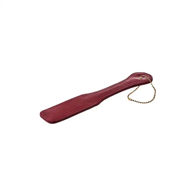  Blaze - Elite Paddle Red. Elitarnie wyglądająca packa z czerwonej sztucznej skóry idealna do zabaw BDSM. Piękne złote elementy. 