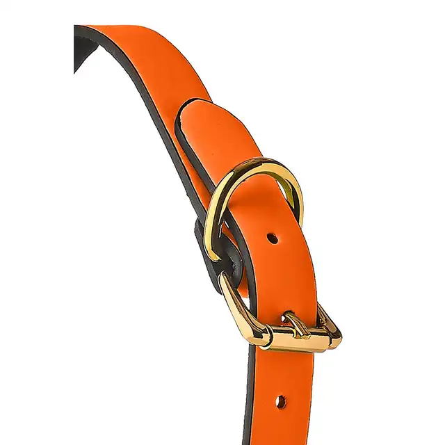 Radiant - Ball Gag Glow In The Dark Orange. Świecący w ciemności knebel z silikonową kulką o średnicy 4 cm. Fluorescencyjnie futurystycznie pomarańczowy. 