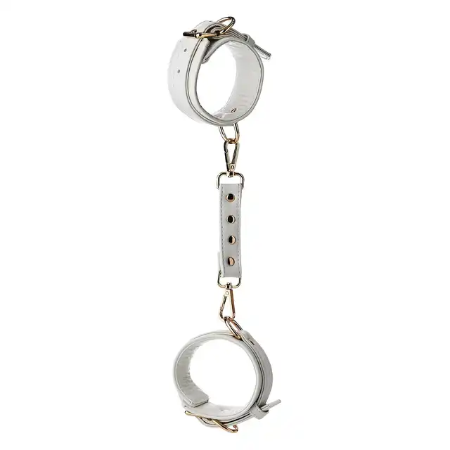 Blaze - Elite Anklecuffs White. Stylowe białe kajdanki na kostki ze złotymi elementami i łańcuchem o 12 cm długości 