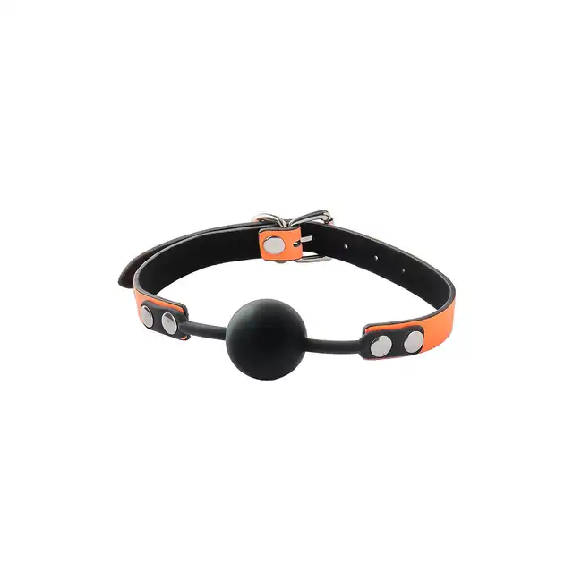 Radiant - Ball Gag Glow In The Dark Orange. Świecący w ciemności knebel z silikonową kulką o średnicy 4 cm. Fluorescencyjnie futurystycznie pomarańczowy. 