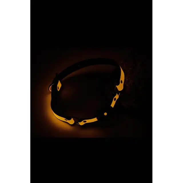 Radiant - Ball Gag Glow In The Dark Orange. Świecący w ciemności knebel z silikonową kulką o średnicy 4 cm. Fluorescencyjnie futurystycznie pomarańczowy. 