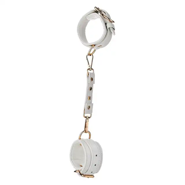 Blaze - Elite Handcuffs White. Stylowe regulowane kajdanki wykonane z białej sztucznej skóry wzbogacone o złote detale. 