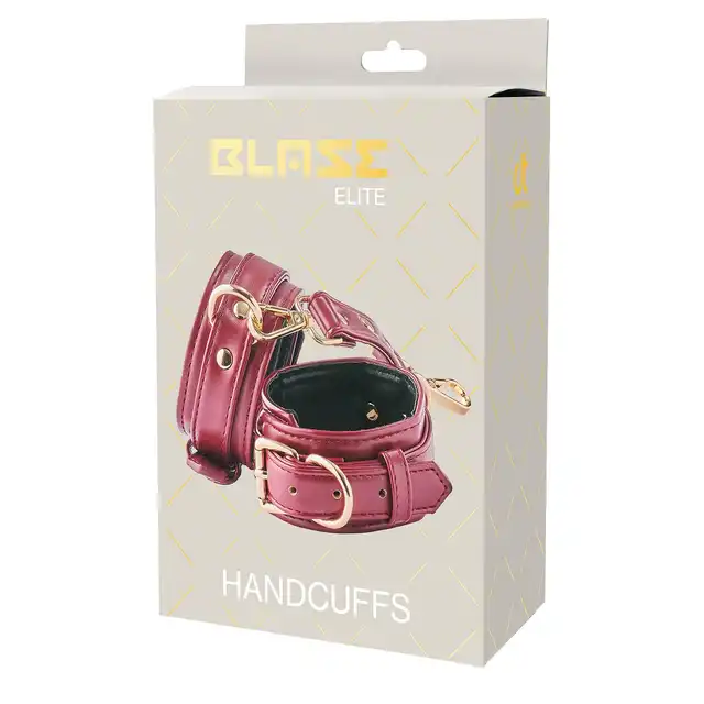 Blaze - Elite Handcuffs Red. Czerwone, stylowe kajdanki z eko skóry ze złotymi dodatkami. Szyk i elegancja. 