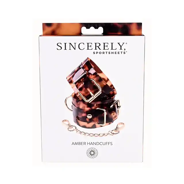 Sportsheets - Amber Hand Cuffs. Bursztynowe kajdanki do seksownego i komfortowego zniewalania. Wykwintny dodatek do sesji niewolniczej