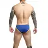 MOB - Toucan Bikini Royal Blue XL. Niebieskie stringi męskie z kieszonką o wzorze dzioba tukana, wyraź swój humor i niezależność