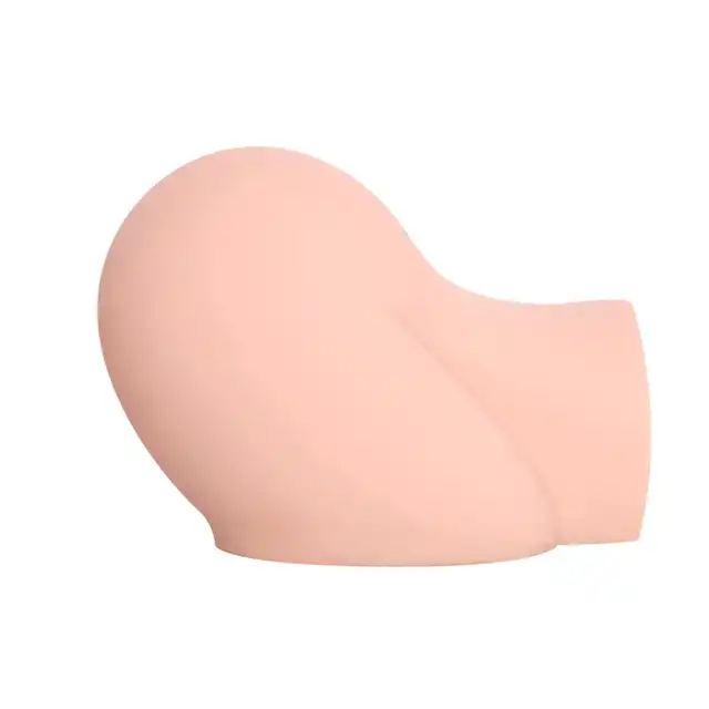 Kokos - Angel 2. Masturbator w formie mocno wypiętych kobiecych pośladków w pozycji na pieska. Realistyczne odczucia, mocna stymulacja
