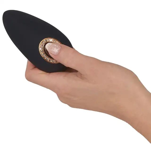 Cleopatra - Clitoral Vibrator. Elegancki stymulator łechtaczki z oprawą imitującą kamienie szlachetne. Bardzo elegancki. 