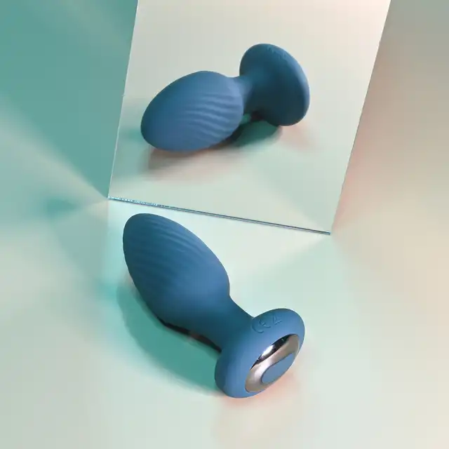 Playboy - Spinning Tail Teaser - wirująca rozkosz z wtyczką wykonaną z gładkiego silikonu. Urzekające tryby wibracji i obrotu