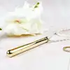 Le Wand - Vibrator Necklace Gold. Elegancki złoty wibrator w formie naszyjnika. Luksusowy naszyjnik z wibratorem o podłużnym kształcie
