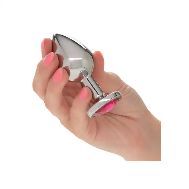 CalExotics - Jewel Large Rose Plug. Metalowy korek analny z różowym kryształkiem w podstawie, srebrny i gładki plug o opływowym kształcie