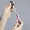 Secret Play - Lip Gloss Vibrant Kiss Brownie. Stymulujący błyszczyk o apetycznym smaku brownie, fale wibracyjne wywołujące mrowienie, pobudza zmysły i zwiększ przyjemność