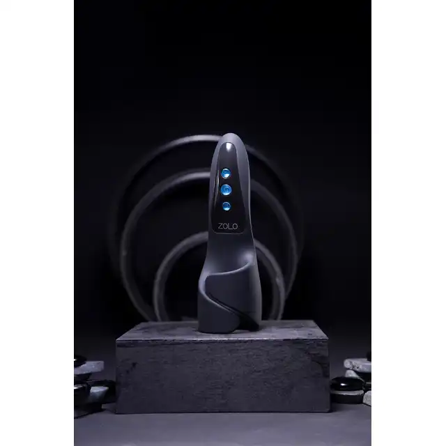 Zolo - Edgemaster. Wibrujący masturbator męski z efektem ściskania i oscylującymi pulsacjami, nowoczesny design i wyjątkowa technologia