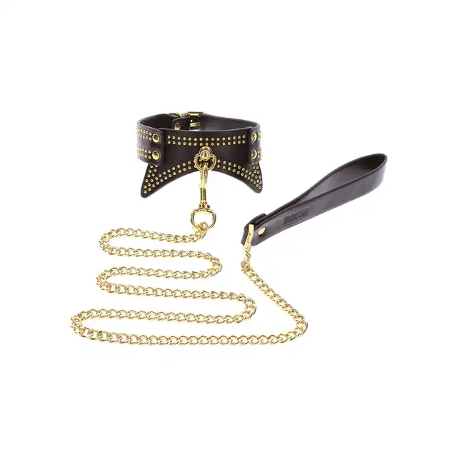 Taboom - Studded Collar and Leash. Czarną obroża ze smyczą, zdobiona złotymi ćwiekami, zapewnia nie tylko stylową, ale także komfortową i intymną powściągliwość