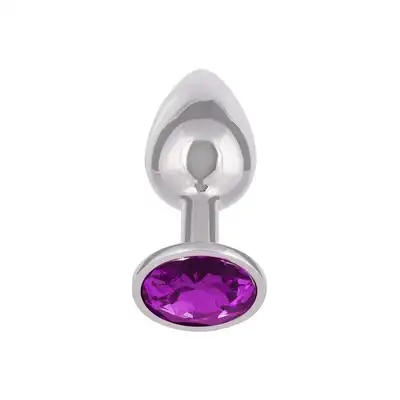 CalExotics - Jewel Small Amethyst Plug. Korek analny o bezszwowej metalowej konstrukcji z fioletowym kryształkiem w podstawie