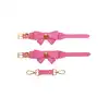 Taboom - Malibu Wrist Cuffs Pink. Różowe mankiety z uroczą kokardką i pozłacanymi detalami, łączące w sobie styl i przyjemność, zapewniające regulowane dopasowanie