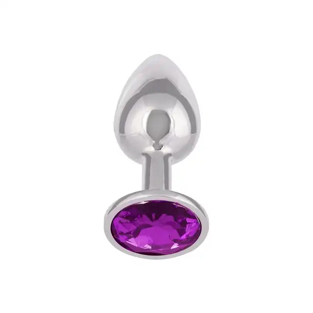 CalExotics - Jewel Small Amethyst Plug. Korek analny o bezszwowej metalowej konstrukcji z fioletowym kryształkiem w podstawie