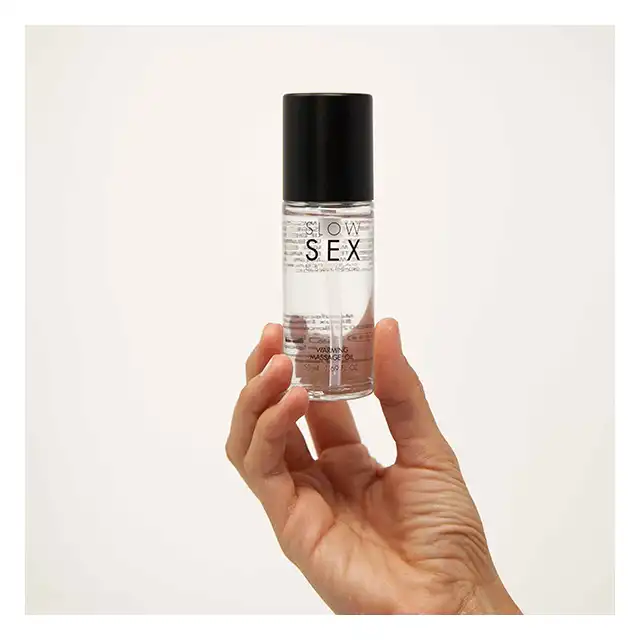 Slow Sex - Warming Massage Oil 50 ml. Rozgrzewający olejek do masażu o kokosowym smaku i gładkiej konsystencji