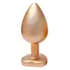 Dream Toys - Gleaming Love Pearl Gold Plug Large. Złoty elegancki korek analny o dużym rozmiarze z kryształkiem w kształcie serca