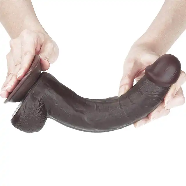 LoveToy - Sliding Skin Dual Layer Dong 9inch Brown. Realistyczne dildo z dwuwarstwowego TPE, wyposażone w technologię przesuwanej skóry i mocną przyssawkę