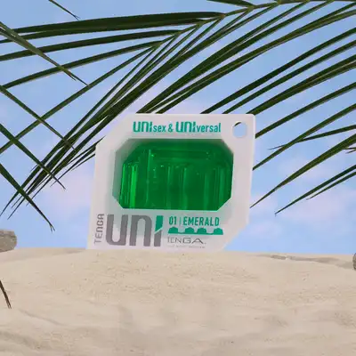Tenga - Uni Emerald Sleeve. Uniwersalna nakładka stymulująca do łechtaczki i penisa, produkt unisex