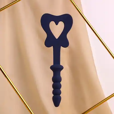 Taboom - Silicone Paddle &amp; Plug Blue. Innowacyjny, silikonowy duet, packa w kształcie motyla z koralikowym korkiem analnym, oferuje podwójną przyjemność