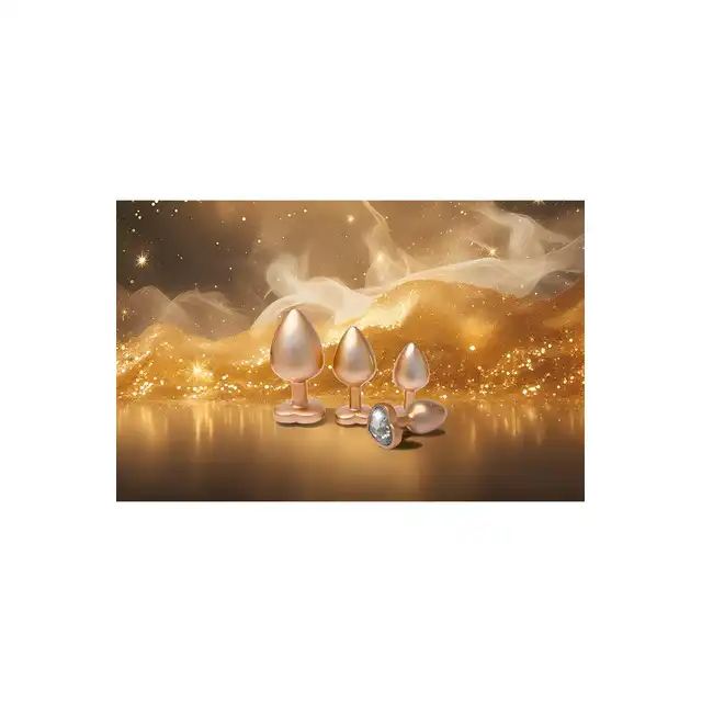 Dream Toys - Gleaming Love Pearl Gold Plug Small. Złoty elegancki korek analny o niedużym rozmiarze z kryształkiem w kształcie serca