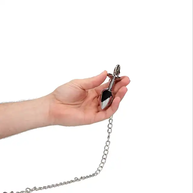 Ouch! - Hearts Paddle with Anal Plug. Packa z korkiem analnym na łańcuszku, zdobione serduszkami. Ostatnia sztuka!