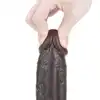 LoveToy - Sliding Skin Dual Layer Dong 9inch Brown. Realistyczne dildo z dwuwarstwowego TPE, wyposażone w technologię przesuwanej skóry i mocną przyssawkę