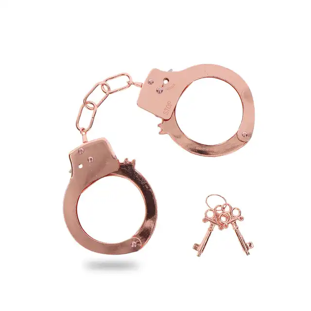 Toyjoy - Rose Gold Metal Handcuffs. Klasyczne metalowe kajdanki w kolorze różowego złota, w zestawie 2 kluczyki